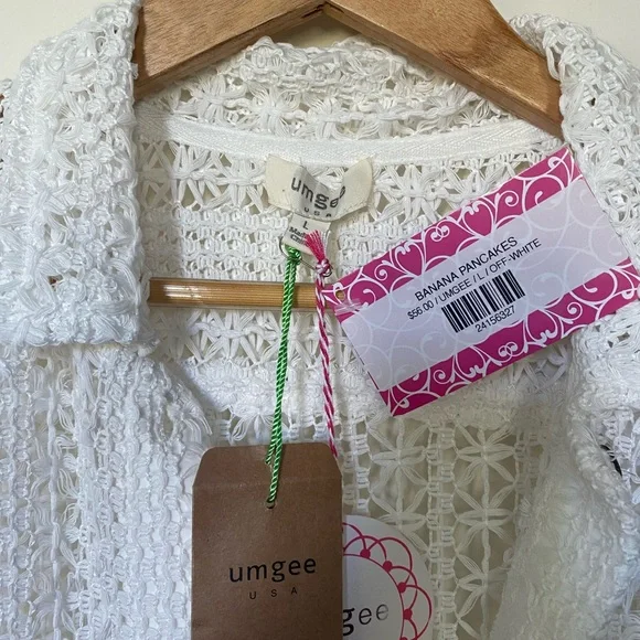 Size large (also fits a Medium) white beach cover up. NWT - Picture 2 of 4